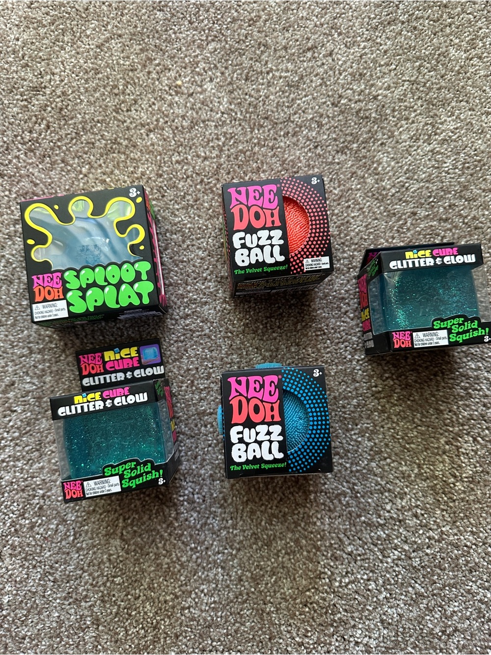 NeeDoh Fuzz Ball, Needoh Sploot splat, and Needoh glitter and glow bundle